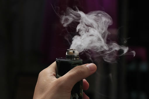 image-of-hand-holding-a-vaping-device